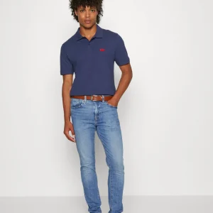 Levi’s Taper – Jeans Fuselé – Medium Indigo jusqu'à 9