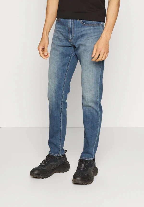 soldes ligne GAP Soft Weka Pass – Jean Slim – Medium Indigo 1